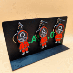 علاقة مفاتيح "لعبة الحبار" - رموز المسلسل الأيقونية في متناول يدك!