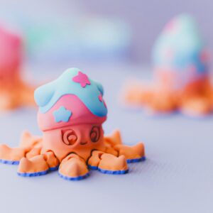 مداليه ولعبة الاخطبوط مع الارجل الصغيره المتحركه