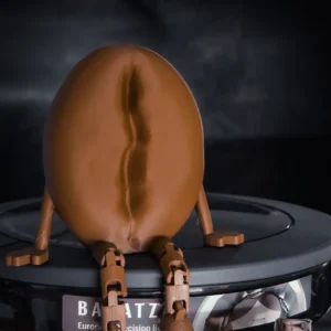 Articulated Coffee Bean - مجسم حبة البن المرن بتصميم "الصديق المفصلي" الجالس